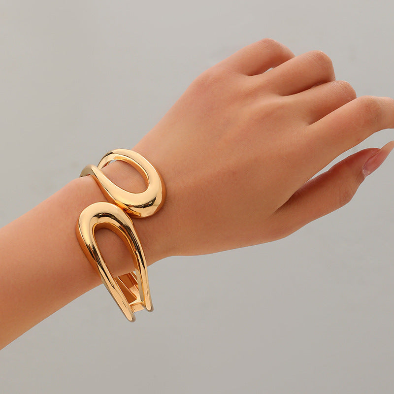 Amaní · Fluid Wave Bracelet