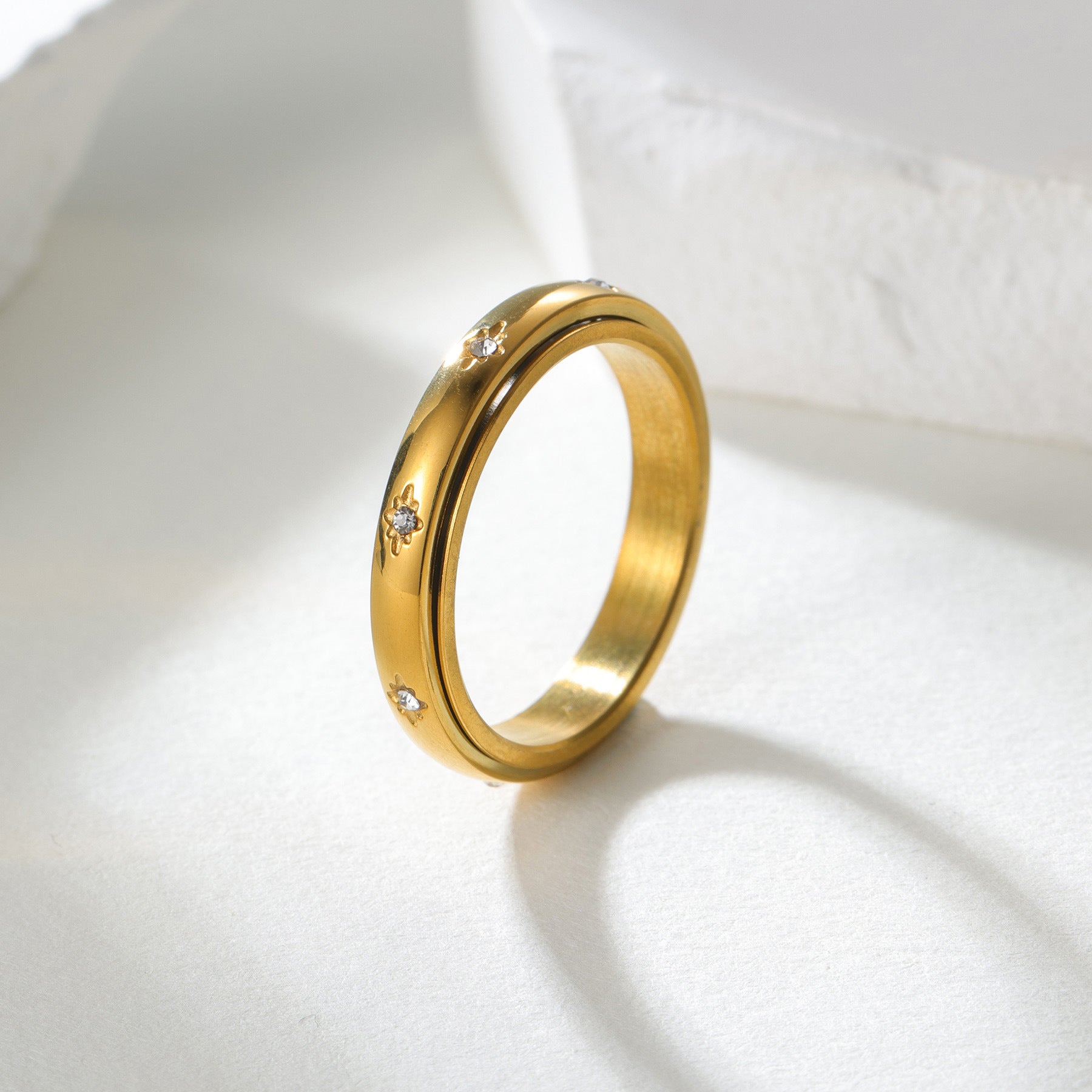 Amaní · Diamond Studded Geometric Rotating Ring